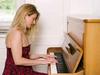 Woman playing piano to relax